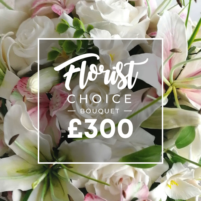 Opulent and densely arranged, this bouquet fills the frame with pristine white and soft blush tones, accented by vibrant green foliage. White roses unfurl their many-petaled faces, while white lilies add architectural height, sometimes bearing faint pink stripes and brown anthers for a touch of sophisticated detail. Smaller clusters of pale pink blooms-perhaps spray roses or alstroemeria-provide subtle contrast, and the greenery grounds the composition with fresh, natural energy. The result is a premium, hand-tied presentation that feels both timeless and contemporary. A crisp white rectangular panel sits at the center, framed by a delicate border, announcing the product as Florist Choice Bouquet. The word Florist appears in an elegant script, while Choice Bouquet is set in a clean uppercase sans-serif, with a generous £300 beneath in bold type. This image, crafted by a trusted local florist, signals a high-value offering suited for luxury gifts, wedding accents, or heartfelt sympathies. Available for delivery across New Barnet and the surrounding districts, the bouquet embodies refined craftsmanship, quiet confidence, and the promise of fresh stems that will speak to the recipient long after the initial presentation.