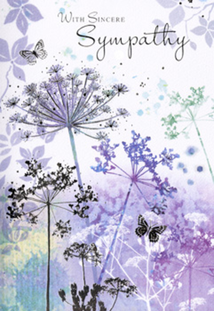 The design inside this sympathy card carries a meditative calm, reminiscent of standing in a still corner of New Barnet's green spaces just after rain. Tall, spindly wildflowers with umbel-shaped heads rise delicately from the lower edge of the card, their stems as fine as threads, painted in a restrained palette of dusky violets, soft lavender, and muted, silvery greens. Each flowerhead is drawn with filigree intricacy, yet softened by the watercolor technique, so edges blur gently into the air around them. Some blooms lean slightly, others arc more upright, creating a natural rhythm that feels like plants swaying in a very light breeze. Two butterflies hover among the blooms, their wings suggested rather than fully outlined, brushed in translucent washes of lilac, dove grey, and pale blue. They appear almost suspended in time, carrying quiet hints of hope and continuity. The background is a softly blurred wash of violet and powder blue, like a sky just before dusk, with hints of cloudlike shapes barely visible beneath the colour. There's a sense of depth without any hard horizon, giving the eye room to rest and wander. The overall effect is gentle and contemplative, similar to the mood I try to create when crafting a subtle funeral arrangement for families around the New Barnet area: present, supportive, and unforced. This card becomes more than paper and ink; it feels like a moment of silence, a respectful pause where memories can surface, and the heart can feel gently held in a time of sorrow.