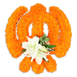 Rendered with the attention of a neighbourhood florist, this floral Khanda is a striking study in orange and white: thousands of bright marigold heads form the emblem's outline and interior, their compact, velvety faces packed so closely they become a luminous, textured plane. The chakkar's perfect curve and the crossed kirpans are modelled from the marigolds with artisanal precision, the overall silhouette maintaining clarity against a pristine white background. At the symbol's central crossing, a tasteful cluster of white lilies rests like a quiet heart-two or more open blooms with softly curved petals and delicate yellow-green stamens, surrounded by smaller buds that lend a sense of life and continuity. Interspersed around the lilies are fine sprays of baby's breath and deep green foliage, possibly salal leaves, which provide a cool, glossy contrast to the warm orange. The arrangement sits slightly raised from the surface, its shadow adding depth; the lighting is gentle and even, inviting touch as well as sight. As a florist serving New Barnet and nearby Oakleigh Park, Flowers New Barnet recognises how such a piece functions in ritual and remembrance: it reads both as a decorative offering for a Gurdwara and as a solemn emblem for festival tables during Vaisakhi or Guru Nanak Jayanti. There is a faint floral scent suggested by the visual-marigold warmth and lily freshness-and an overall impression of reverence, community craft and seasonal celebration rooted in local care around Station Road and the surrounding streets.