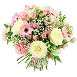 This hand-tied bouquet is shown against a bright white background, making the pastel colours and rich textures appear almost luminous, as though arranged in natural daylight streaming into a New Barnet flower shop. Central to the composition are several creamy white roses, fully opened yet still structured, their velvety petals forming perfect rosettes that speak of timeless elegance. Nestled around them, clusters of pink spray roses and buds introduce layers of soft blush and warm rose tones, each bloom adding intimacy and a sense of closeness, like a gentle embrace. A few vivid pink gerbera daisies provide playful highlights, their dark, textured centres drawing the eye and bringing modern energy that would feel at home in a stylish New Barnet café or townhouse. Light pink carnations, with densely ruffled petals, enhance the bouquet's volume and give it a cushioned, cloud-soft look, suggesting comfort and tenderness. Threaded delicately through the arrangement are white alstroemeria, their slender petals and fine speckles adding subtle detail that rewards a longer gaze. Wisps of white gypsophila hover between the flowers, creating a soft, misty veil that smooths every edge. Fresh green leaves and stems anchor the design, their cool tones setting off the pinks and creams much like greenery in nearby parks such as Oakhill or Tudor Park. The stems are carefully bound together, clearly prepared as a ready-to-gift bouquet, ideal for celebrating new beginnings, gentle congratulations, or welcoming a new baby to a New Barnet home with same-day floral delivery.