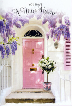 A serene New Barnet entranceway is captured in full, romantic detail, as if paused just before someone arrives with a fresh set of keys. Above the threshold, trailing wisteria in soft shades of lavender and lilac spills gracefully from a canopy, each dangling cluster catching the light and suggesting a powdery, nostalgic fragrance. The walls are whitewashed and slightly textured, reflecting the daylight that drifts in from nearby Monken Hadley Common, while a pale painted shutter adds a charming, village-like feel typical of side streets off Barnet High Road. At the centre stands a lightly weathered pink door, its pastel hue radiating warmth and reassurance, like a long-held dream of the perfect new home finally coming true. Resting on the doorstep is a sleek grey metal bucket, carefully filled by an experienced florist with lush white and cream roses arranged in a natural, overflowing style. Sprays of soft green foliage thread between the blooms, adding movement, depth, and just the right hint of woodland freshness. Around the bucket's base, a blush-pink ribbon is tied in an elegant bow, repeating the door's hue and turning the bouquet into a beautifully composed housewarming gift. The atmosphere is gentle, hopeful, and quietly celebratory, evoking the emotions of moving into a first flat near New Barnet station or settling into a family home off Lyonsdown Road. This is the kind of floral doorway scene that feels made for congratulating someone on their new address, offering comfort, optimism, and a graceful welcome with every petal.