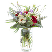 This meticulously crafted bouquet, ready for delivery throughout New Barnet, is a testament to gentle sophistication and thoughtful design. At its heart, velvety deep red roses unfold in full bloom, symbolizing enduring love and appreciation. These elegant blooms are beautifully complemented by snowy white Gerbera daisies, whose bright petals reflect the clear light streaming into New Barnet's welcoming homes. Subtle accents of blush-lavender Lisianthus intersperse among the larger flowers, adding softness and a hint of promise. Invigorating eucalyptus leaves, silver-green and rounded, curve gracefully through the arrangement, their cool aroma reminiscent of nearby woodland walks in Tudor Park. Beneath, strong, glossy foliage supports the structure, with one broad leaf artistically wrapping the bouquet's base to introduce a sleek, modern touch. Light, airy sprays of white filler blooms create volume and interest throughout, echoing the cheerful markets along East Barnet Road. Every stem is set in clear water within an elegant glass vase, accentuating the freshness and vitality of the flowers. This bouquet delivers not just colour and texture, but a subtle sense of celebration and renewal-the perfect gift for an anniversary, birthday, or to simply bring the serenity and charm of New Barnet into any setting.