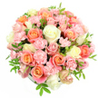 A soft, rounded bouquet of roses and spray carnations appears like a pastel cushion of petals, perfectly composed against a pure white background that echoes the calm of a peaceful morning in New Barnet. The flowers are gathered so tightly into a dome that the low container beneath becomes almost invisible, leaving the impression of a floating garden. Large roses, fully open and velvety, form the focal points in hues of peach, coral, and warm salmon pink, their spiralling petals giving a sense of gentle movement. Nestled between them are creamy white and delicately pale yellow roses, which brighten the design and introduce a fresh, luminous contrast. Framing these are countless small, light pink spray carnations, their finely ruffled petals filling every gap, adding depth and a soft, cloud-like texture. Slender green leaves weave subtly between the blossoms, offering just enough foliage to suggest natural growth while preserving the pastel focus. The lighting is bright and even, catching the smooth curves of the rose petals and the intricate, frilled edges of the carnations, as if the bouquet has been photographed in clear daylight. This arrangement feels joyful yet soothing, ideal for welcoming a new baby, saying thank you, or sending love to a home near High Barnet station. It is the kind of design a local florist might recommend when you want something elegant but not showy, a bouquet that conveys affection, appreciation, and a sense of new beginnings with every carefully placed bloom.
