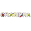 A long, horizontal floral tribute spelling out GRANDMA dominates the frame, displayed against a stark white background that draws attention to its detail and craftsmanship. Each capital letter is carefully constructed from clusters of small white chrysanthemums, their tightly layered petals creating a plush, almost quilted effect across the surface of the word. Just below the white blooms, a slender halo of pale lavender flowers gently outlines every letter, adding a soft wash of colour and helping the shapes stand out clearly without disturbing the calm, peaceful feeling of the arrangement. On the leftmost letter, G, three velvety red roses rest on the lower curve, tucked into deep green foliage that accentuates their rich tone and speaks of enduring love. The first A is decorated with two yellow-green orchid blooms set along its central bar, their unusual colour and speckled centres bringing a note of quiet individuality. In the middle, R, N and D are left purely white with the lavender edging, forming a serene, unbroken band across the heart of the tribute. Moving towards the right, the M carries another three red roses at its lower right side, visually tying the centre back to the opening letter, and the final A repeats the pair of fresh green orchids, giving the design a pleasing symmetry from end to end. All the letters are mounted on a single dark metal rail that runs behind them, barely visible but essential for support when the tribute is displayed at a funeral service. The whole piece feels thoughtful and dignified, the sort of personalised GRANDMA arrangement a New Barnet family might choose to honour a much-loved matriarch at a local chapel or crematorium.