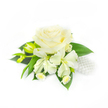 A refined wrist corsage or boutonniere photographed on a pure white background, centred on a single, creamy-white rose whose layered petals fold inward like soft porcelain and then peel back into a plush, voluminous heart. Around the rose, slender white Peruvian lilies (alstroemeria) open in delicate sprays, their slightly elongated petals catching a gentle, cool light that reveals faint veins and a satiny sheen. To the left, two narrow green buds stand tucked and elongated, hinting at blooms yet to unfurl and adding a sense of natural growth to the composition. Beneath the main flowers a scatter of tiny, daisy-like white florets with pale yellow centres nests close to the stem, bringing an intimate, cottage-garden detail and a playful texture against the larger petals. Broad, deep green leaves form a glossy backdrop, their smooth surfaces and defined midribs grounding the arrangement and heightening the contrast with the soft whites. On the right, a small cluster of lustrous, spherical white pearls is woven into the foliage, catching highlights and lending a classic, bridal shimmer that reads as jewelry tucked into blooms. The lighting is soft and even, the white background amplifying the arrangement's purity and the cool, fresh scent one imagines from morning-cut flowers. A piece like this reads as quiet elegance for a wedding, prom, or formal reception-crafted with careful balance, tactile layers, and a timeless palette that conveys calm, dignity, and gentle celebration in every petal.