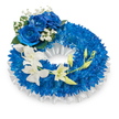 A serene, circular funeral wreath composed of rich blue and pure white blooms, photographed against a clean white background under soft, diffused light that highlights textures and depth. The wreath's body is densely packed with countless deep sapphire-blue chrysanthemums whose fine, spidery petals form a voluminous, cushiony ring; their layered faces read as a textured sea of cobalt that suggests quiet dignity. Lining the inner curve and peeking beneath the flowers is a ruffled white satin ribbon-pleated and glossy-its subtle sheen providing a refined, tactile contrast to the matte petals. At the upper-left quadrant a clustered trio of large, fully opened blue roses commands attention; their velvety, azure petals turn gently outward, richly saturated and slightly velvet-dark at the base, evoking a feeling of solemn beauty. These roses are framed by airy sprays of tiny white gypsophila and a few deep green leaves, adding lightness and traditional sympathy notes. From the mid-left, a graceful cascade of pristine white orchids-Phalaenopsis-like in shape-flows down toward the lower right, each orchid's delicate, rounded petals and faint central markings lending an ethereal calm. Interspersed among the open orchids are pale green buds in various stages of opening, suggesting renewal and continuity amid remembrance. The overall scent is faint and floral-orchid sweetness overlaid on the earthier chrysanthemum note-while the composition reads as carefully hand-assembled by a local New Barnet florist who understands how to balance colour, texture and meaning. This wreath feels respectful, contemplative and beautifully suited for memorial services and condolence tributes in the New Barnet area.