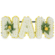 A carefully modelled, three-dimensional sympathy tribute spells out the letters N A N in bold capitals, each letter built from a thick, cloud-like carpet of small white chrysanthemum spray flowers that catch a soft studio light and read as pure, gentle texture. Around the edge of every letter a bright ring of sunny yellow button chrysanthemums or miniature carnations is stitched with precision, the smaller blooms forming a crisply defined, cheerful border that lifts the composition and gives each character clear definition against the plain white background. The two outer N letters are given a little extra warmth with compact clusters of richer yellow buds and deep green foliage tucked into their central uprights; glossy oval leaves, a few fern-like fronds and tighter green sprigs sit against the yellow to add depth, shadow, and a living contrast to the snowy flower faces. The central A is intentionally left unadorned so its serenity and the purity of the white chrysanthemums can speak plainly. A discreet dark green or black support bar runs behind the top of the letters to hold the trio together and suggests a freestanding memorial display that would sit respectfully at a graveside or in a funeral chapel. The overall effect is calm, consoling and modestly upbeat - an understated celebration of memory that balances respect with a hint of sunshine. As a local New Barnet florist I imagine this laid near New Barnet Station or Brunswick Park, where neighbours might gather to remember a beloved nan; the arrangement's crisp white and yellow language reads clearly at a distance while offering gentle texture up close.