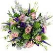 From a bird's-eye view, this bouquet appears as a luxurious circle of colour and texture, thoughtfully composed by local New Barnet florists to feel both modern and romantic. At its core, full-headed roses in soft blush, dusty pink, and muted mauve unfurl in delicate spirals, their petals layered so generously you can almost sense their silky touch and light, powdery fragrance. Dancing around them are clusters of dainty lavender asters with bright yellow centres, creating a sprinkling of light that softens the richer hues, much like the gentle glow over Greenhill Gardens on a calm afternoon. Deeper tones come from velvety purple and indigo lisianthus, their ruffled, bell-shaped blooms tucked between the roses to create pockets of shadow and depth that draw the eye inward. Slim spikes of vivid purple Veronica rise through the arrangement, adding graceful vertical lines and giving the bouquet an uplifting sense of movement and energy. Interwoven among the petals are spherical, moss-like green flower heads in vivid chartreuse, their playful, almost sculptural texture offering a fresh, contemporary contrast to the classic blossoms. Soft, silvery eucalyptus leaves curl around the flowers, their blue-green sheen and subtle, herbal aroma providing a restful backdrop. Additional foliage in varying greens fills out the design, ensuring no gaps, only flowing layers of leaves and blooms. Set against a simple white ground, the colours appear particularly radiant, making this bouquet perfect for celebrating a special birthday, welcoming someone to a new home in New Barnet, or sending a heartfelt thinking of you with same-day delivery that brings a touch of garden beauty indoors.