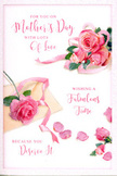 This Mother's Day card feels like a quiet moment of affection captured on paper, much like placing a freshly arranged bouquet on a windowsill overlooking New Barnet's tree-lined streets. Across a soft white background, clusters of pink roses are arranged with a relaxed, natural grace, their petals opening in full, generous spirals that invite the eye to linger. Hues range from the faintest whisper of blush to deeper rose pink, recalling the gentle tones of spring flowers in a sheltered back garden off Lyonsdown Road. The roses sit together in loose groups, never overly tight, creating the impression that they have just been gathered and laid down with care. Scattered around them, individual petals lie as if they have drifted free over time, forming a romantic frame that feels both spontaneous and intentional. Some petals overlap in small piles, others rest alone, their curved edges catching the light and suggesting a soft, velvety touch. A pastel-coloured ribbon weaves through the main bouquet, curling around the largest cluster in a flowing loop that brings a florist's artistry to the composition, much like the finishing touch added at the worktable before a Mother's Day delivery leaves the shop. The ribbon's gentle line leads your gaze toward the hand-lettered message above, where warm, elegant script offers loving wishes to a special mother. The lettering has a personal, handwritten quality, with sweeping curves and varied thickness that echo the natural shapes of the petals. Bathed in calm, even light, the entire scene radiates warmth, gratitude, and the soft joy of a Mother's Day greeting paired with beautiful, thoughtfully arranged flowers in New Barnet.