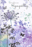 This sympathy card unfolds like a quiet visual poem, echoing the peaceful corners of New Barnet when the day is just beginning to soften. Across the inner panel, fine, airy silhouettes of wildflowers stretch upward on slender stems, their umbels rendered in graceful shades of lavender, indigo, and soft misty blue. The petals and florets are delicately sketched, then washed with translucent watercolor so that some edges fade into the surrounding space, giving an impression of flowers caught mid-sway in a gentle breeze. Soft washes of muted purple and cool blue drift behind them, with hints of silvery-green tones seeping through like distant foliage seen through morning haze. Scattered among the stems, subtle butterflies hover, their wings traced in pale lilac and silvery-grey, barely darker than the background, as if they were gentle spirits resting for a moment among the blooms. The light feels diffused, with no harsh contrast-just a soothing glow, as calming as pausing on a quiet New Barnet side street after a rain shower. The entire composition is cool yet comforting, a tender balance of space and detail that reflects the same sensitivity we bring to condolence flowers for local families. There is a script message placed above or alongside the floral scene, written in an elegant, flowing hand that harmonises with the artwork rather than overpowering it. Together, the words and imagery offer a respectful embrace-unobtrusive, thoughtful, and steeped in the reassurance of nature's gentle cycles and the enduring presence of memory.