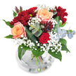 This bouquet, inspired by the welcoming spirit of New Barnet's bustling lanes and green parks, weaves together rich, romantic hues and subtle, modern accents. Front and centre, peach-apricot roses unfurl their soft, spiralled petals, surrounded by velvety burgundy chrysanthemums and a deep red rose that nestles among glossy leaves. Airy gypsophila floats throughout, adding a light, whimsical touch that softens the vibrant colours-like the gentle morning fog that settles over local gardens. Distinctive sprigs of eucalyptus peek out, their cool silver-green tones and subtle scent bringing an invigorating freshness to the composition, much like a brisk stroll near East Barnet Village. The base is accented with dark plum succulent-like foliage, infusing depth and an unexpected twist. All these elements are elegantly gathered in a clear, round glass vase, where water cradles the neatly arranged stems. The result is a bouquet brimming with heartfelt emotion and fresh artistry, ideal for birthdays, romantic gestures, or simply brightening a household in New Barnet with a sense of natural beauty and comfort.
