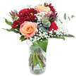 A bouquet born from both drama and grace, this arrangement captures the vibrant spirit of New Barnet. At its heart, velvety maroon chrysanthemums form a lush backdrop, their deep color catching the eye and lending an air of strength. In front, apricot roses, full and softly blushed, unfurl petals with a buttery texture that hints at romance and new beginnings. Airy baby's breath is scattered throughout, its tiny white blossoms like a gentle sprinkling of spring across the design. Glossy, verdant leaves anchor the bouquet, while eucalyptus sprigs stretch outward, infusing the air with a fresh, herbal scent evocative of strolls through local gardens or Church Hill Road. The entire arrangement is presented in a transparent glass vase, the stems crisscrossing in a casual tangle that suggests freshness just gathered from a New Barnet floral market. Sunlight streams across the flowers, accentuating each color shift and giving a sense of depth and vitality. Perfect for heartfelt occasions-be it a birthday, an anniversary, or a sincere apology-this bouquet brings a refined yet accessible elegance to any home or celebration in New Barnet, embodying the thoughtful simplicity that local florists value.